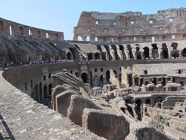 The Colosseum in Rome had seating for 50,000 spectators. Most of the stones used for construction of the building were taken by citizens of Rome in the Middle Ages for construction of other buildings in the city. The upper level of the Colosseum had supports for 240 masts that held up a canvas awning to shield spectators from sun and rain.
