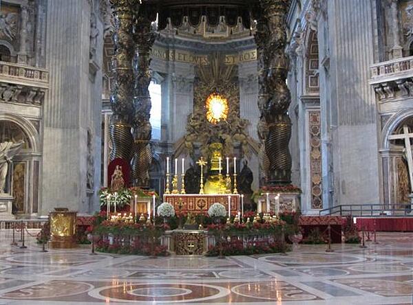The main altar in Saint Peter's Basilica in Rome is covered by a 30m- (98 ft-) tall bronze baldacchino (canopy) designed by Gian Lorenzo Bernini.