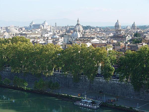 The ancient and historic city of Rome, showing the dome of the Pantheon on the left, the Monument of Victor Emanuel II in the left background, and various church domes.