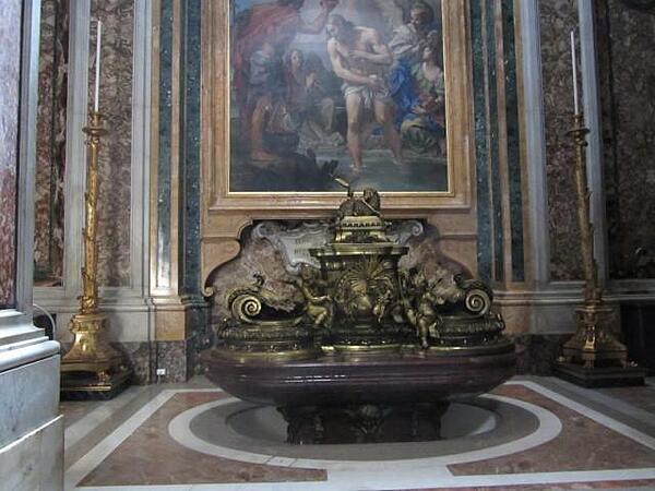 Baptismal font in St. Peter's Basilica in Rome.
