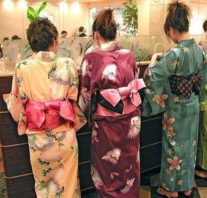 Colorful kimonos in a Tokyo coffee shop.