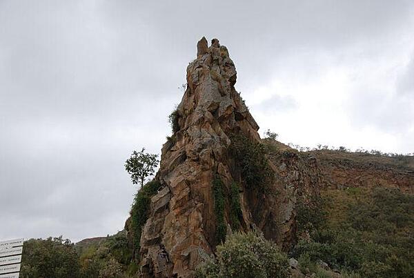 Fischer's Tower at the eastern entrance to Hell's Gate Gorge in Hell's Gate National Park. The park is named after a narrow break in some cliffs, the site of a tributary to a prehistoric lake that fed early humans in the Rift Valley.