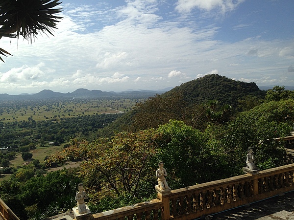 Countryside view of Battambang province in northwestern Cambodia with its scattered low hills that break up the flat terrain.
