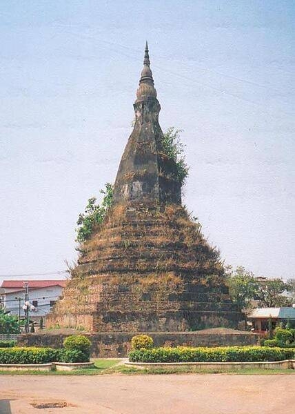 A stupa is a mound-like structure containing Buddhist relics. Located around the corner from the US Embassy in Vientiane, That Dam ("the black stupa") is one of the oldest Buddhist monuments in Vientiane.  Legend holds that a seven-headed dragon lives underneath the stupa and protects the city.