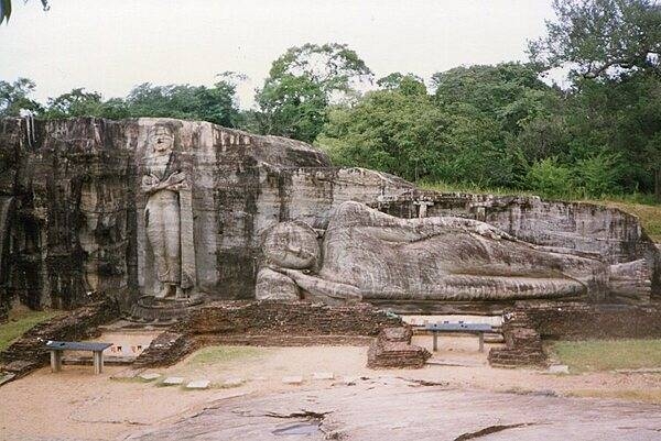 The Gal Vihara (the stone temple), known originally as the Uttararama, is a rock temple of the Buddha located in the ancient city of Polonnaruwa in North Central Province, Sri Lanka. It was carved during the reign of Parakramabahu I (1153-1186). The temple consists of four rock relief statues of the Buddha, which have been carved into the face of a single granite outcropping. The reclining Buddha is just over 14 m (46 ft) in length, making it one of the largest sculptures in South Asia. The city of Polonnaruwa has been designated a World Heritage Center.