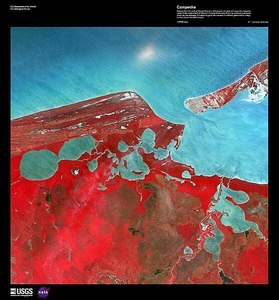 Named after the ancient Mayan Province of Kimpech, the state of Campeche comprises much of the western half of Mexico's Yucatan Peninsula. Rivers in southern Campeche drain into the immense Terminos Lagoon, the entrance to which is protected by a long barrier island, Isla Del Carmen (upper right). In this false-color satellite image the green jungle canopy shows up as bright red. Image courtesy of USGS.