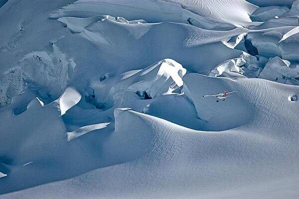 A sightseeing plane over Fox Glacier in Mount Cook National Park, South Island.