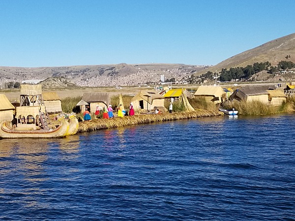 Lake Titicaca on the Peru-Bolivia border is the highest navigable lake in the world at 3,805 m. The lake has floating islands made from totora reed layers that are replenished constantly.