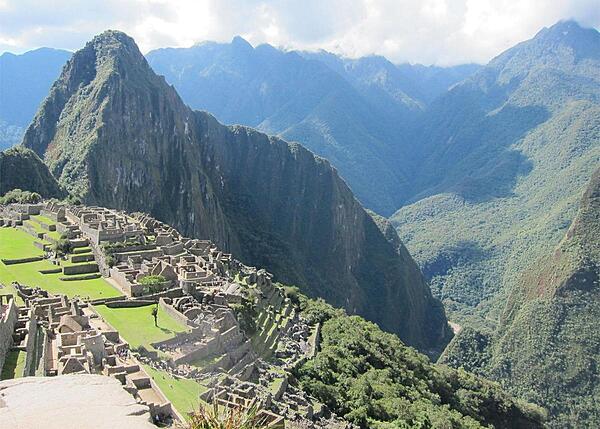 The Urubamba River bends around Huayna Picchu's base.