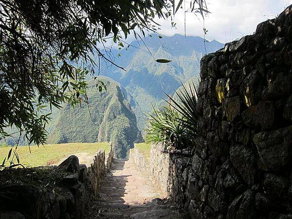 A section of the Inca Trail near the Machu Picchu ruins. The Trail between Cusco, the Inca's ancient capital, and the ruins is approximately 80 km (50 mi).