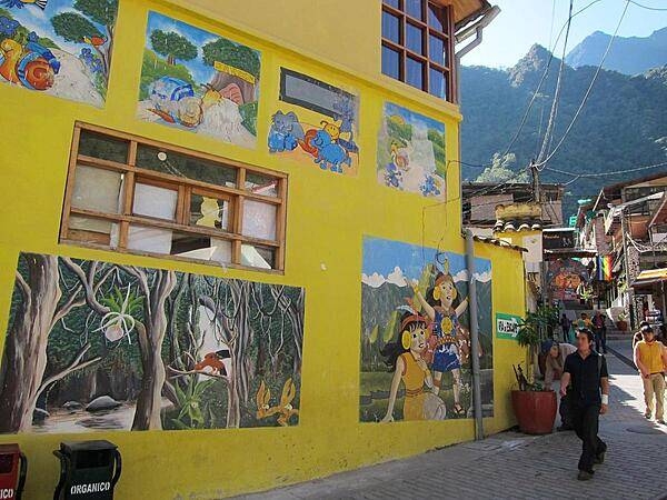 Murals reflecting an area's history or other subjects of interest to the locals are a common sight in Peru. This mural is in Aguas Calientes.