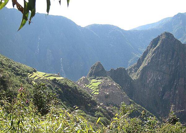 Machu Picchu (Old Mountain) in the foreground and Huayna Picchu (Young Mountain) on the right as viewed from the Inca Trail.