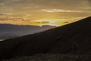 As part of a multinational training exercise, US Marines and US Sailors, Australian soldiers, and British soldiers hike a hill along the Kokoda Track in Papua New Guinea in 2015. The exercise was designed to provide assistance to Papua New Guinea through infrastructure rehabilitation and basic military training. Photo courtesy of the US Marine Corps/ Cpl. William Hester.