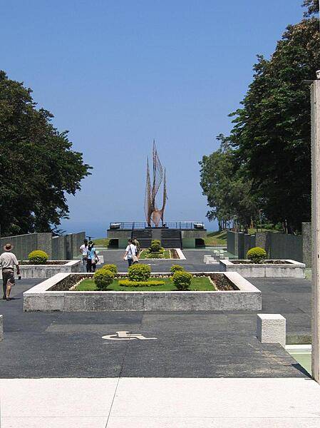 On the grounds of the Pacific War Memorial, Corregidor. The sculpture is entitled the "Eternal Flame of Freedom."