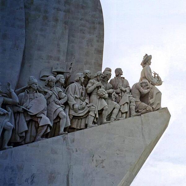 A detail from the Padrao dos descobrimentos (Monument to the Discoveries) in Lisbon, which celebrates the contributions of the Portuguese in the Age of Discovery during the 15th and 16th centuries. The main statue of Henry the Navigator (1394-1460), holding a model of a carrack, leads a procession of 32 figures (16 on either side ramp) on the monument. This view is of the west side.