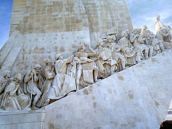 Closeup of the figures on the west side of the Padrao dos descobrimentos (Monument to the Discoveries) in Lisbon, which honors monarchs, explorers, navigators, cartographers, scientists, and missionaries from the Age of Discovery (15th and 16th centuries). The main statue of Henry the Navigator (1394-1460), holding a model of a carrack, leads a procession of 32 figures (16 on either side ramp) on the monument.