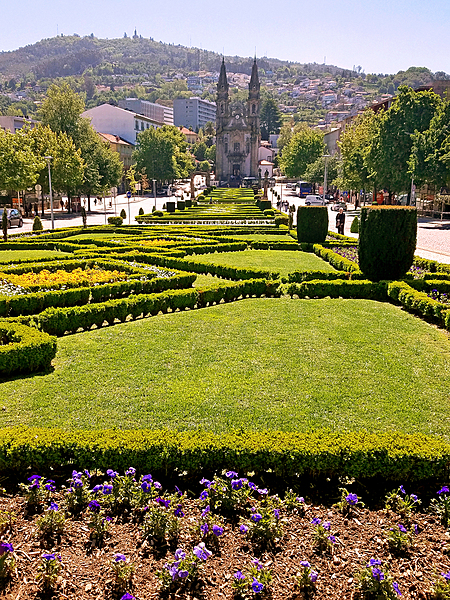 The medieval section of Guimaraes opens onto the “Largo Republica do Brasil (Republic Square of Brazil)” with its formal flower gardens. One end of the square features the slim Nossa Senhora da Consolacao e dos Santos Passos (Church of Our Lady of Consolation and the Holy Steps), one of the loveliest examples of Portuguese Baroque architecture.