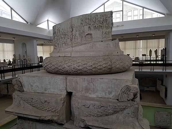 Cast of part of the base of Trajan's Column (the original stands in Rome) at the National Museum of Romanian History in Bucharest. The bas reliefs on Trajan's Column - which is about 30 m (98 ft) in height, 35 m (115 ft) including its large pedestal - depict the  second century A.D. Roman conquest of Dacia, the area that today is Romania and Moldova.