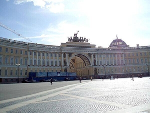 The General Staff Building in Saint Petersburg's Palace Square was built in the 1820s.  The arch commemorates the victory over Napoleon; it is topped by a bronze sculpture of Victory herself riding a six-horse chariot.  Under the Russian Empire, the West Wing housed the General Staff, while the East Wing contained the Foreign Ministry and the Finance Ministry.  The building is now part of the Hermitage Museum.