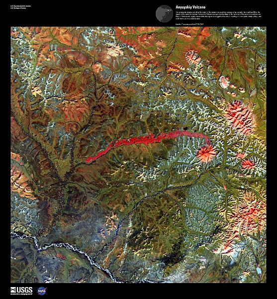 The prominent crimson streak in the center of this false-color satellite image represents the remains of a 50 km (31 mi) lahar (volcanic mudflow) that cut a strip of barren rock through rich vegetation surrounding the Anyuyskiy Volcano. The currently dormant volcano is the orange circular shape at the right end of the streak. Remote and largely inaccessible, the Kamchatka Peninsula is a rugged collection of towering volcanic peaks, steep valleys, active geysers, and wild, snow-fed rivers and streams.  This volcano is part of the UNESCO World Heritage Site "Volcanoes of Kamchatka." For other active volcanoes in Russia, see the Natural hazards-volcanism subfield in the Geography section. Image courtesy of USGS.