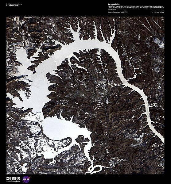 Nicknamed "Dragon Lake," this body of water is formed by the Bratskove Reservoir, built along the Angara River in southern Siberia, near the city of Bratsk. At its inauguration in 1967, the Reservoir was the largest artificial lake in the world with a surface area of 5,470 sq km (2,110 sq mi). This high-resolution satellite image was acquired in winter, when the lake was frozen. Image courtesy of USGS.