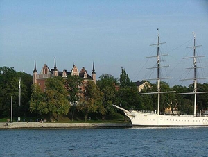 Admiralty House (built 1647-50) on the islet of Skeppsholmen in central Stockholm. Formerly occupied by the Royal Swedish Navy, it today houses the Swedish Tourist Association. The steel, full-rigged ship is the "af Chapman." Built in the UK in 1888, it served as a training ship and made several trips around the world. No longer in active service, it presently is a youth hostel.