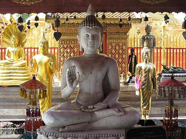 Buddahs saying "sawatdee" or hello in Chiang Mai, which has over 300 Buddhist temples.