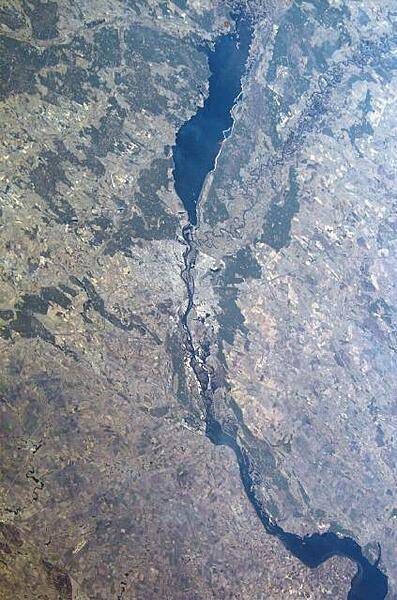 This image - taken from the International Space Station - shows the Ukrainian capital city of Kyiv stradling the Dnieper River. North of the city is the Kyiv Reservoir, one of a series of lakes created by dams along the Dnieper. Image courtesy of NASA.