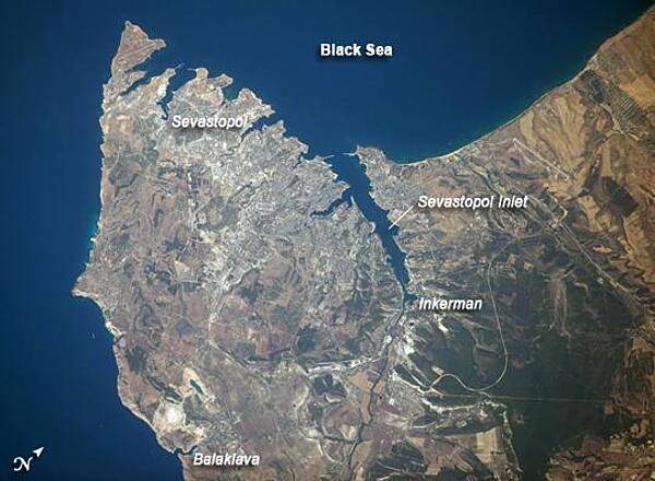 The port city of Sevastopol is located in southernmost Ukraine on the Crimean Peninsula. The city is an important naval base due to the numerous inlets and bays along the coastline. During the Cold War, the city was the base of the Soviet Black Sea Fleet, but now it services vessels of both Ukraine and Russia. The main economy of the city is based on trade and shipbuilding, but Sevastopol is also a popular tourist and resort destination. Photo courtesy of NASA.