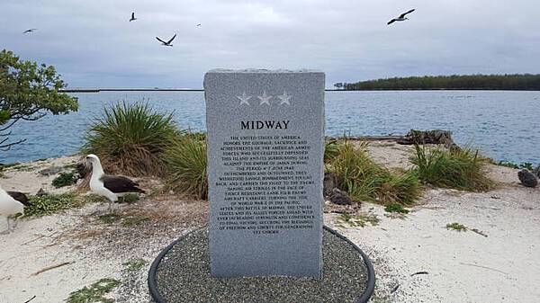 The American Battle Monuments Commission authorized the creation of a Midway Memorial Marker in May 2013 to commemorate the 4–7 June 1942 Battle of Midway. On 12  August 2015, the Midway Memorial Marker was officially erected on the island. Image courtesy USFWS/ Megan Nagel.