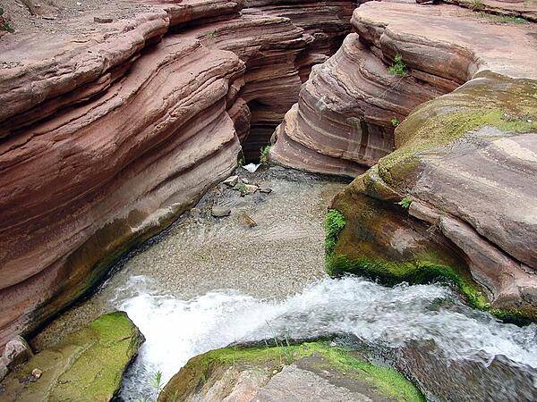 Looking down over a waterfall near the head of the chasm along Deer Creek in the Grand Canyon. Image courtesy of the USGS.