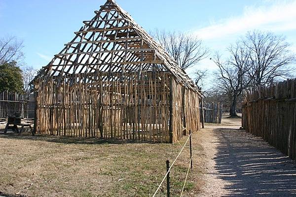 Inside the reconstructed 1607 James Fort at Jamestown National Historic Site, Virginia. The building frame displays the first phase of 17th century house construction. Photo courtesy of the National Park Service.