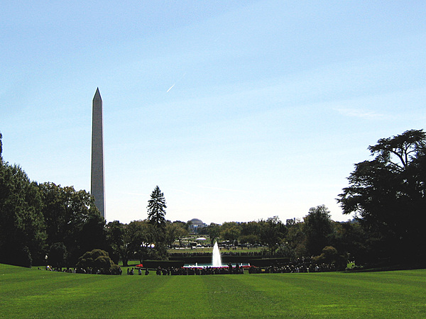 View from the south lawn of the White House; in the distance is the Washington Monument (on the left) and the Jefferson Memorial (at center).