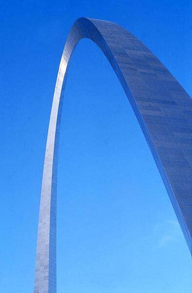 The Gateway Arch in St. Louis, Missouri, the iconic symbol of the city. The monument honors the westward expansion of the United States, much of which began in this city. Built between 1963 and 1965 (but not opened to the public until 1967), the stainless steel-sheathed structure is hollow to accommodate a unique tram system that takes visitors to an observation deck at the top. Both the height and width of the arch are 192 m (630 ft). The structure is the tallest monument in the United States and the tallest stainless steel monument in the world.