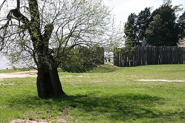A view of the modern palisades marking the 1607 James Fort location at Jamestown National Historic Site, Virginia. The statue inside the fort is of John Smith, who played an important role in the establishment of a colony at Jamestown, Virginia - the first permanent English settlement in America. Photo courtesy of the National Park Service.