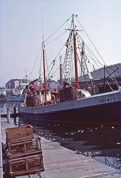 A typical lobster boat docked along Cape Cod in Massachusetts.