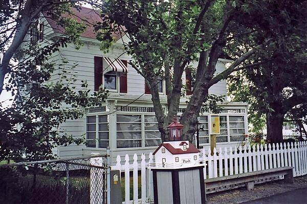 Even the trash bins on Tangier Island, Virginia show a lighthouse motif. There are very few cars on the island; most folks get around by golf cart, bicycle, or on foot.