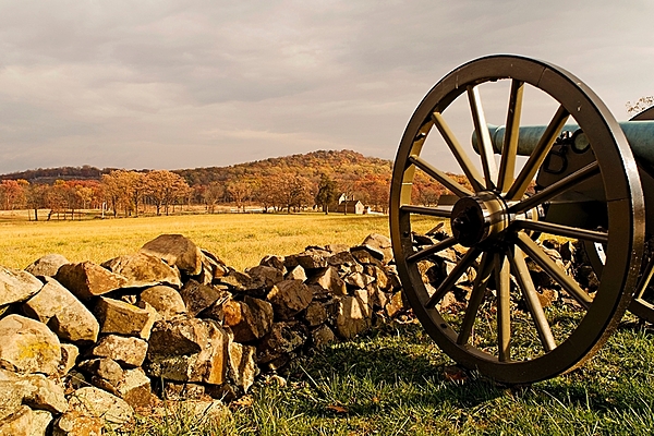 A view of the Round Tops as seen from a southern cannon in Gettysburg National Military Park, Gettysburg, Pennsylvania. The three-day Battle of Gettysburg (1-3 July 1863) in the US Civil War was the largest ever battle fought in the Western Hemisphere involving roughly 175,000 Union and Confederate soldiers. Union forces’ ability to hold Little Round Top hill on the Union extreme left flank on the second day of fighting helped blunt the Confederate attack and set the stage for victory the following day. Image courtesy of the US National Park Service.
