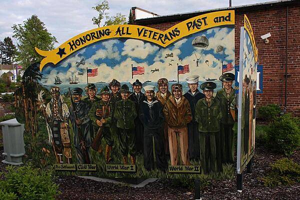A local Post Falls artist painted this memorial that honors veterans of all conflicts dating back to the pre-settlement warrior and forward to . . .