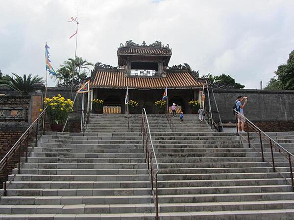 The Khiem Cung Gate at the Emperor Tu Doc Tomb in Hue. Tu Doc ruled Vietnam from 1848 to 1883; his tomb complex was built between 1864-67. Tu Doc lived at the luxurious complex after its construction along with his 100 wives and concubines.