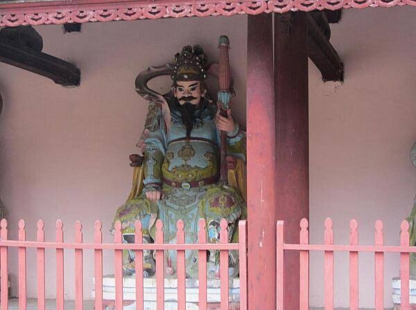 A figure at the Thien Mu Pagoda in the city of Hue.
