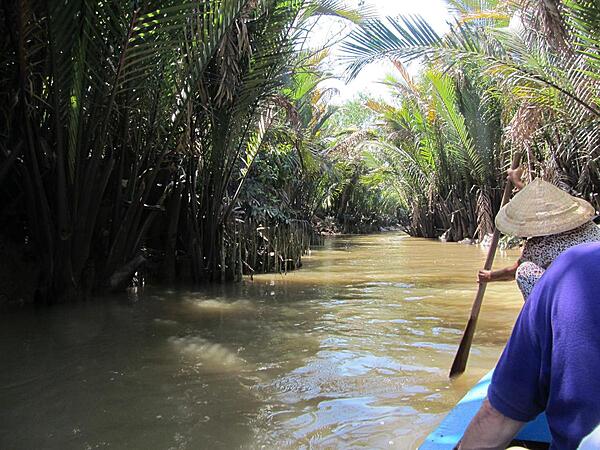 Canal ride on Thoi San Island (Unicorn Island) on the My Tho River near the city of My Tho. The My Tho River is a branch of the Mekong River.