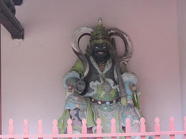 A figure at the Thien Mu Pagoda in the city of Hue.